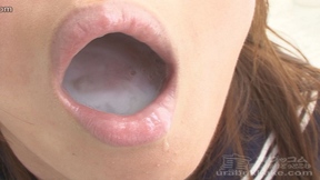 Kogal Nao filling her mouth with bukkake cumshots